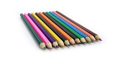 colored pencils on a white background