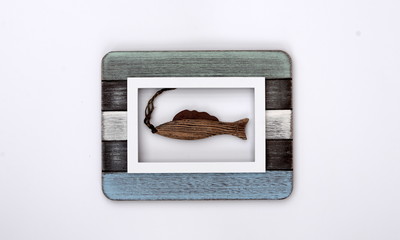 framed fish, wooden frame with a fish