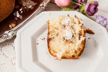 Slice of Easter Dove on a white dish.