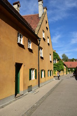 Fototapeta na wymiar FUGGEREI - the world's oldest social housing complex, in Augsburg, Bavaria, region Swabia, Germany