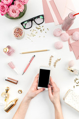 The female hands and smart phone 