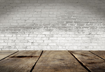 Wood table with White brick wall background