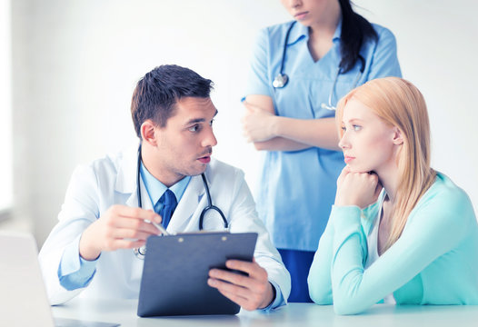 Male Doctor With Patient