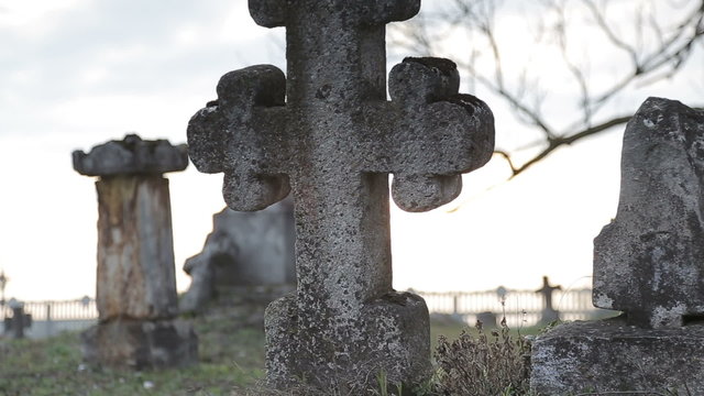 It is very old cemetery. There are many graves from 16 to 21 centuries. It was shot just before sunset therefore some lightflares are very real. Full HD video shot with Canon 6d 25fps and slider.