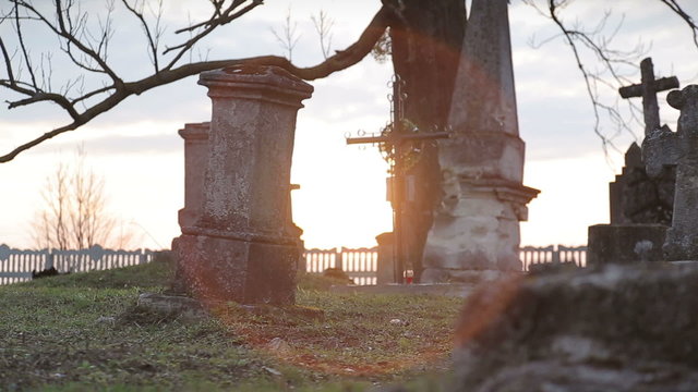 It is very old cemetery. There are many graves from 16 to 21 centuries. It was shot just before sunset therefore some lightflares are very real. Full HD video shot with Canon 6d 25fps and slider.
