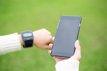 Woman use of mobile phone connect to smart phone
