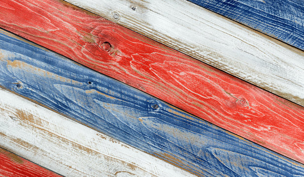 Angled faded boards painted in USA national colors for Labor, Memorial, Veteran or Independence holiday background 