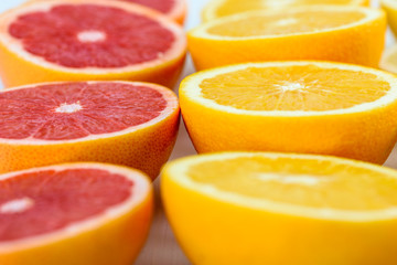Fototapeta na wymiar Red Oranges, Oranges And Grapefruit Citrus Fruit Slices