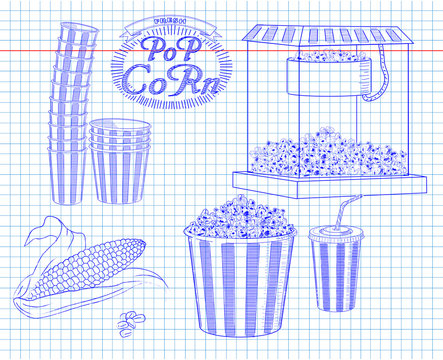 Popcorn machine, ear of corn, stack of small & big popcorn boxes