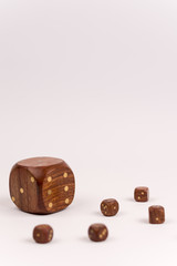 Wooden dices isolated on the white background