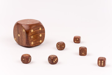 Dices in selective focus over white background