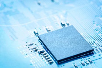 Close up on microchip on computer motherboard.