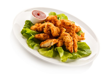 Fried chicken nuggets and vegetables 