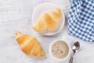 Fresh croissants and coffee