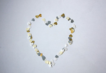 Heart frame of small love hearts on white background