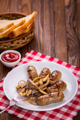 sausages and mushrooms on a plate