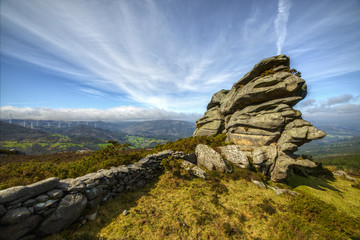 old stone wall and granitic rocks