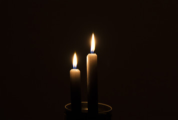 Two candles in the dark