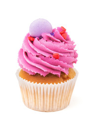 cupcake with pink buttercream isolated on white