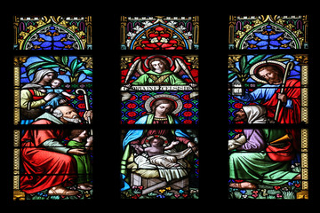 Nativity Scene, Adoration of the Shepherds, stained glass window in parish church of Saint Mark in...