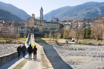 people cross bridge italy Bobbio  piacenza emilia romagna
