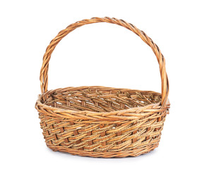 Brown wicker basket on white