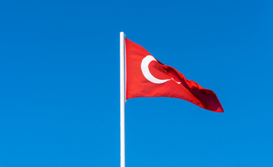 flag of Turkey on blue sky