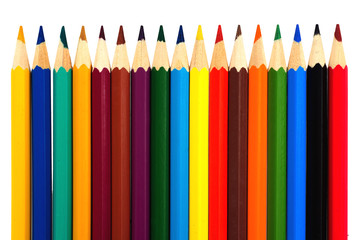 line of colored pencils isolated on white background