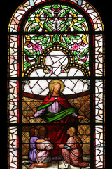 Jesus friend of children stained glass window in the Church of St. Vincent de Paul in Zagreb,...