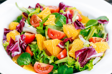 Fresh Orange vegetables salad on plate
