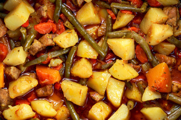 steamed mix of vegetables with meat and green beans