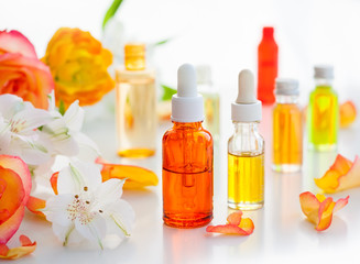 Fototapeta na wymiar Bottles of essential aromatic oils