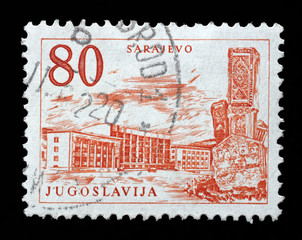 Stamp printed in Yugoslavia shows Sarajevo railway station and obelisk, Bosnia and Herzegovina, circa 1958.