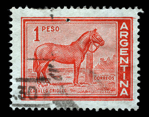 Stamp printed in Argentina with the image of the Caballo Criollo breed which is the native horse of...