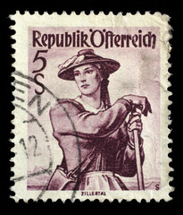 Stamp printed in Austria shows image woman in national Austrian costumes, Ziller Valley, series, circa 1948