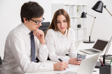 Fototapeta premium Businessman and businesswoman in office