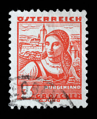 Stamp printed in Austria shows a woman in the Austrian national dress with the inscription 