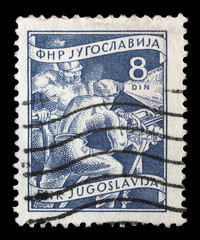 Stamp printed in Yugoslavia shows miners, domestic economy Series, circa 1952