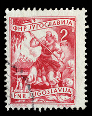 Stamp printed in Yugoslavia shows woman to harvest sunflowers, domestic economy series, circa 1952