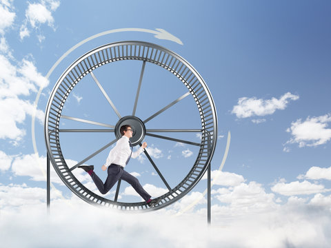 Man in spinning wheel