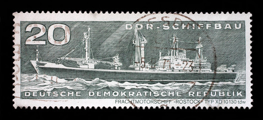 Stamp printed in GDR from the GDR Ship Building issue shows Container Cargo Ship Rostock Typ XD 10130 tdw, circa 1971.