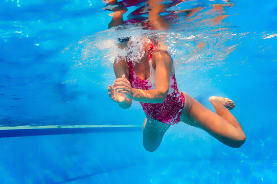 Breaststroke swimming, underwater view