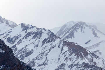 Fototapeta na wymiar snow-capped mountains of the Tian Shan in winter