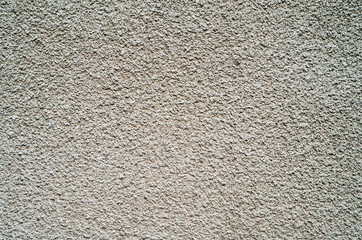 Detail of gray wall closeup uneven granular