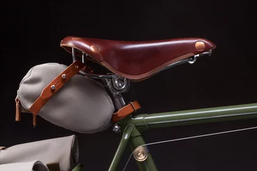 Deurstickers Stylish vintage bicycle saddle © Stramyk Igor