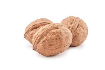 Three walnuts isolated on white