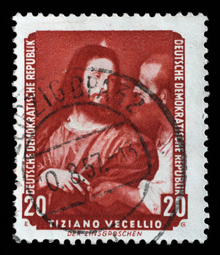 Stamp printed in DDR shows the painting Tax coppers, by Tiziano Vecellio , from the series Famous Paintings from Dresden Gallery, circa 1957.