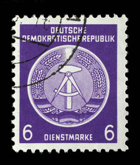 Stamp printed in GDR (German Democratic Republic - East Germany) shows DDR national coat of arms with inscription Service Stamp, series GDRs national coat of arms, circa 1952