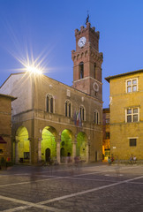 Fototapeta na wymiar morning twilight on the square in Tuscany city in Italy