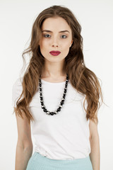 Beautiful Brunette Girl with hairstyle and make up